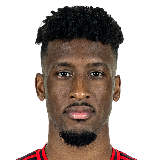 K. Coman